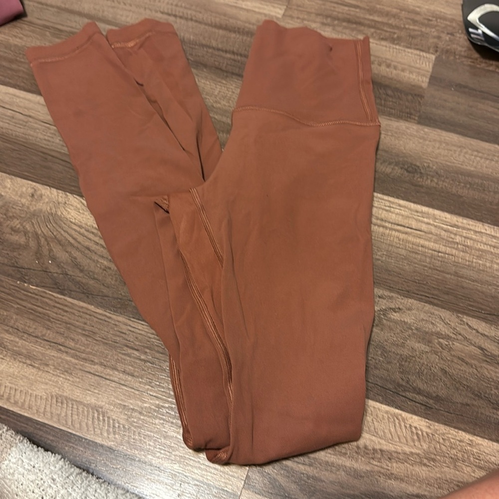 Lululemon super high rise leggings size 2 length 28 barely worn camel color